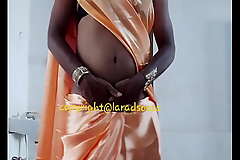 indian sexy crossdresser slut Lara D'Souza in orange satin saree