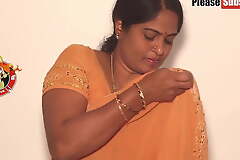 Mother wearing a yellow saree, video