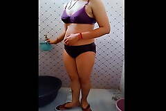 Hot Bhabhi bathing in panties, showing her ass