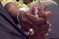 Desi woman gives young man hand job vulnerable acclimatize
