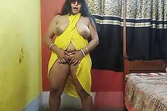 Sexy Bengali Bhabi fucking involving Cucumber in her bedroom in yellow dress