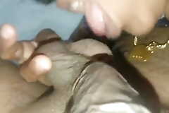 A Malayali housewife enjoys engulfing her husband's balls all round her mouth