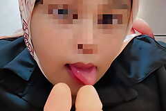 Hijabi girl takes two dildo