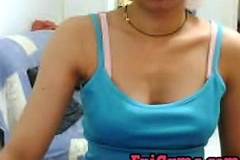 Low-spirited Indian girl plays exposed to cam