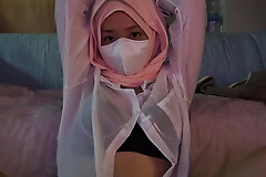 A Lovely Petite Hijabi Doing Porn