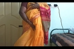 desi  indian horny tamil telugu kannada malayalam hindi cheating wife vanitha enervating orange colour saree  showing big boobs and shaved pussy excite hard boobs excite nip rubbing pussy masturbation