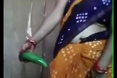 Desi aunty playing with cucumber